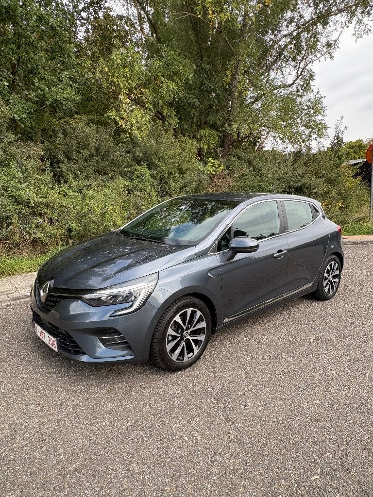 Renault Clio Clio Hybrid 1.6i E-TECH Intens, Auto's, Automaat, Dealer onderhouden, Leder en Stof, 5 deurs