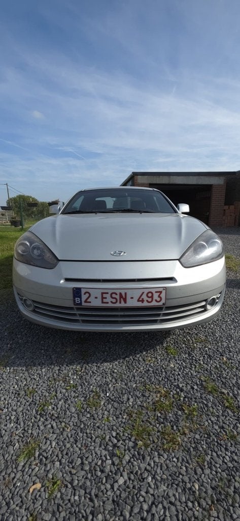 Hyundai Coupe 1.6i 16V, Auto's, 4 zetels, Leder en Stof, Handgeschakeld, Euro 4
