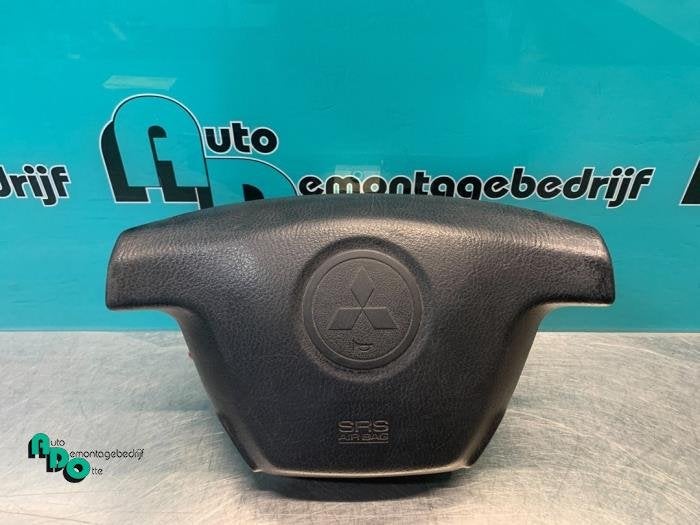 Airbag gauche (volant) d'un Mitsubishi Lancer (Lancer 03-), -, 3 mois de garantie, Utilisé, Mitsubishi