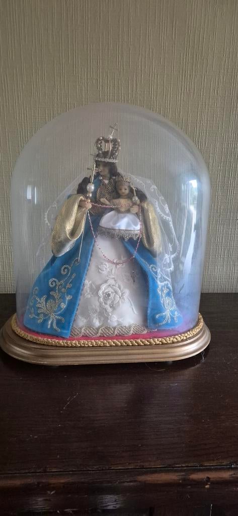 Mariabeeld met kind in was in stolp, Ophalen