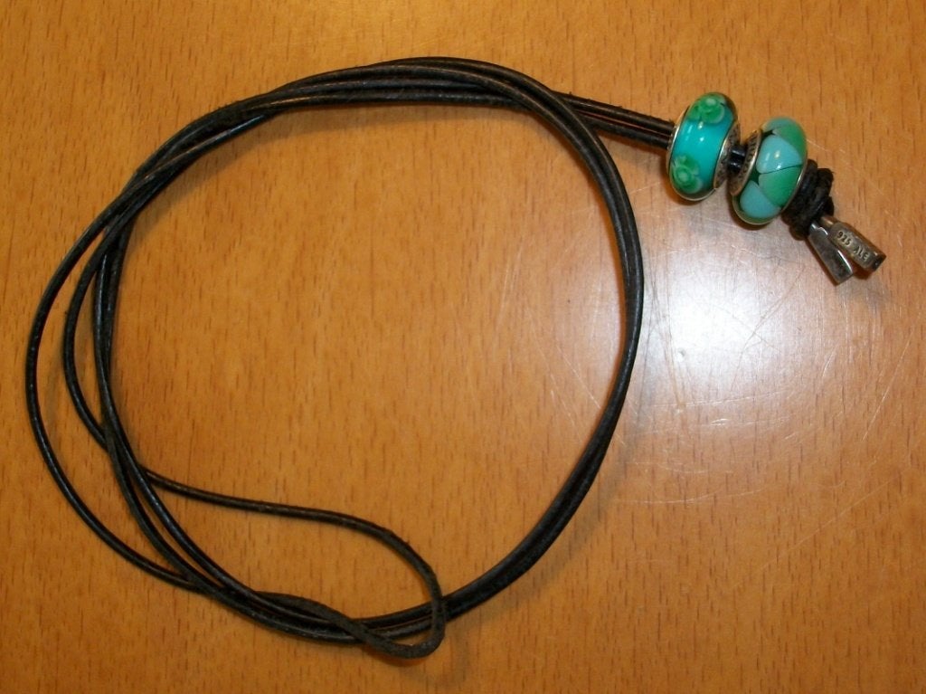 Te koop: Mooie zwarte veter van Pandora., Handtassen en Accessoires, Bedels, Ophalen, Gebruikt, Pandora