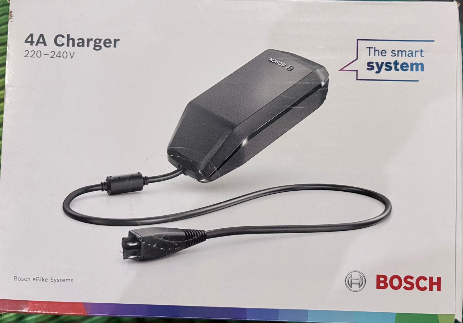 Nieuwe originele Bosch 4A eBike Charger – Smart System., Fietsen en Brommers, Fietsaccessoires | Fietsaccu's, Nieuw
