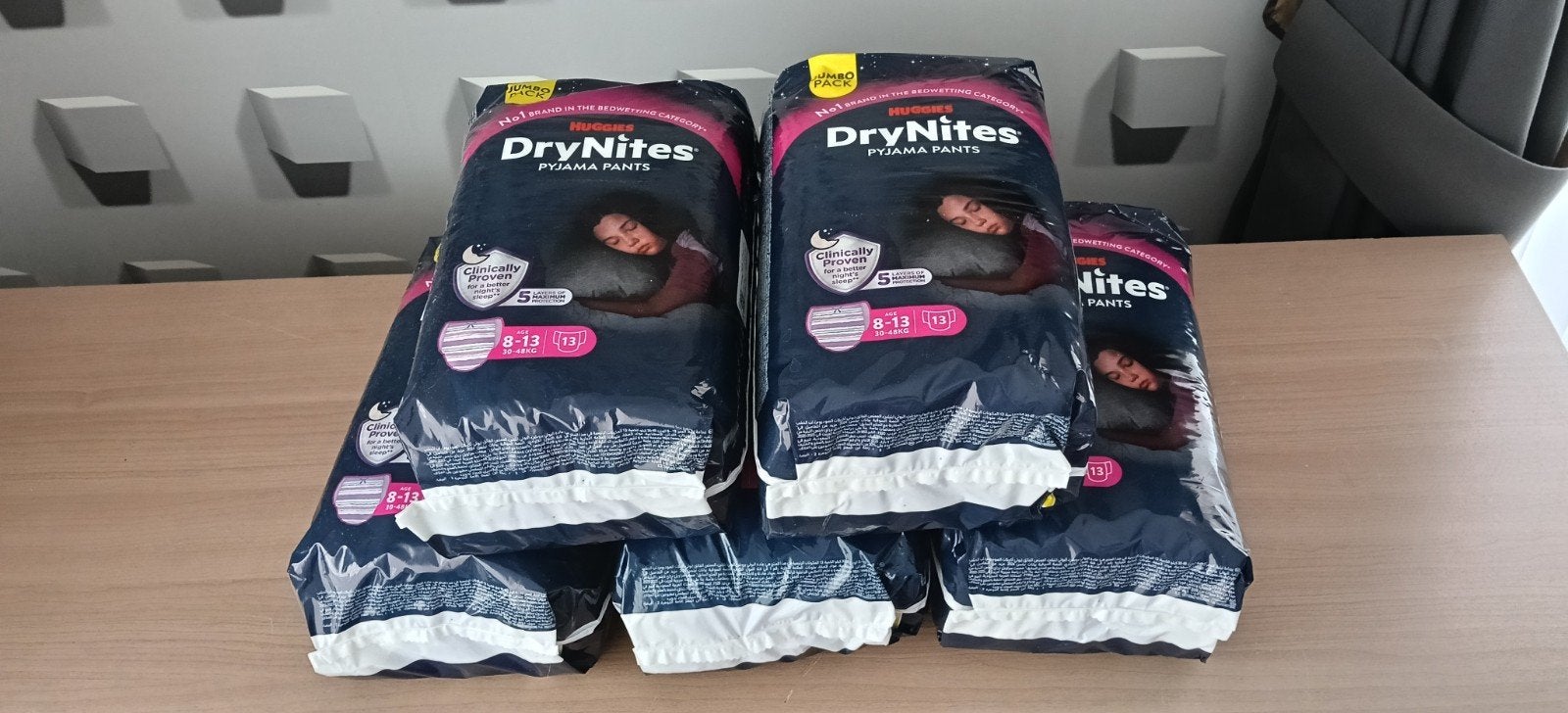 €25 voor 5 nieuwe pakken pampers DryNites pants meisje nr.13, Enlèvement ou Envoi