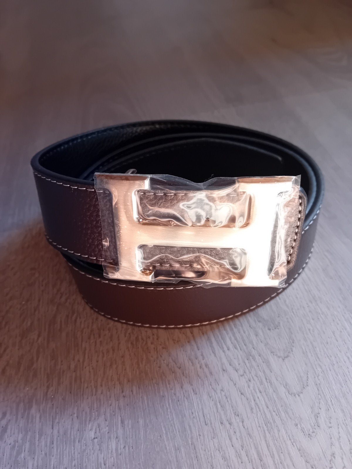 Riem met H-logo, Kleding | Heren, Riemen en Ceintuurs, Ophalen of Verzenden, Nieuw, Bruin, Riem of Ceintuur