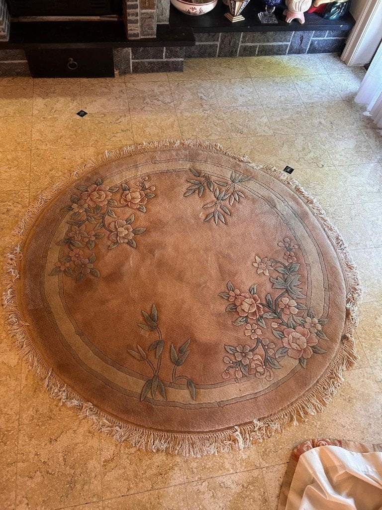 Rond tapijt, Ophalen, Rond