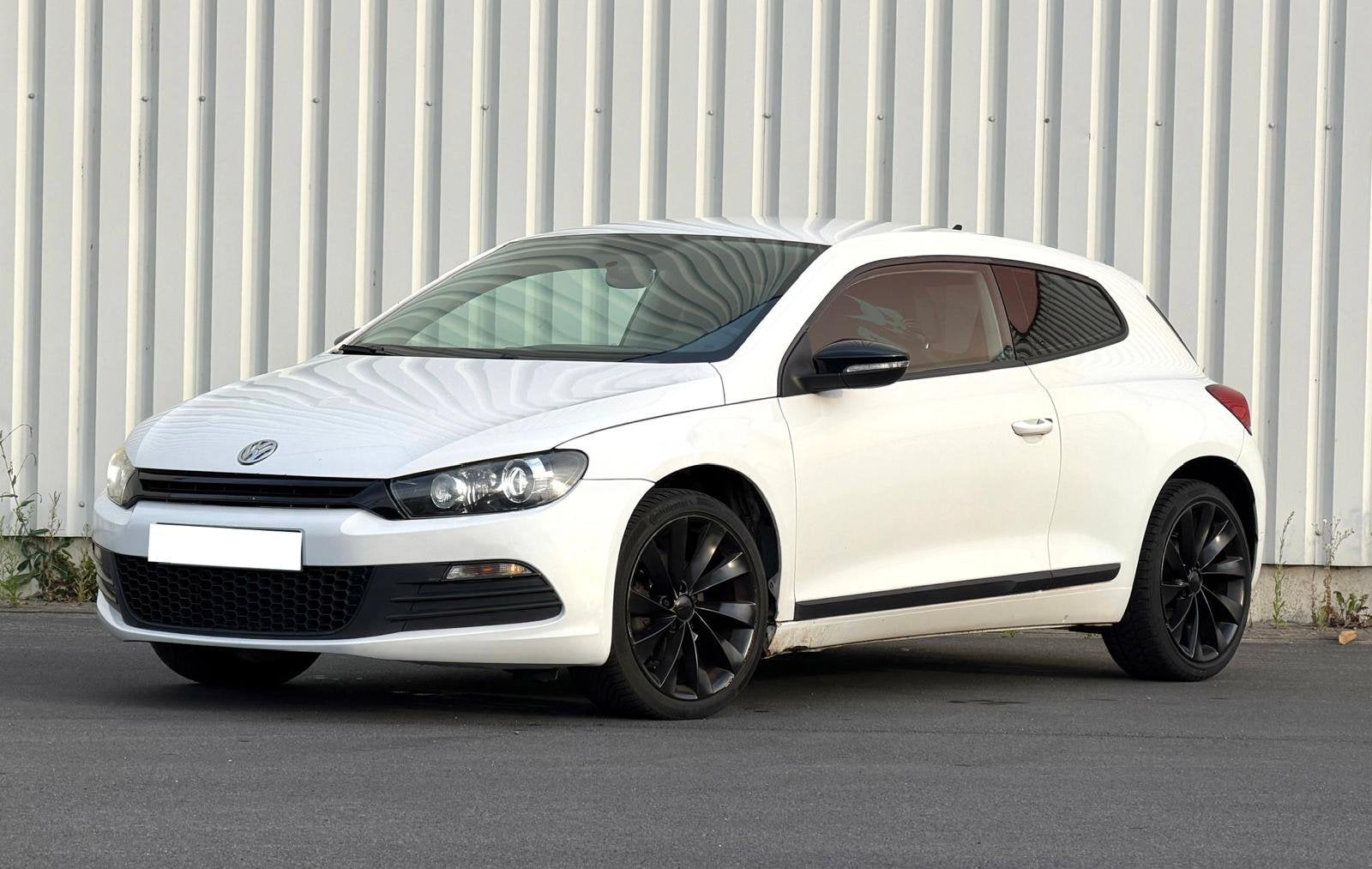 Volkswagen scirocco 1.4 benzine coupe 2011 + keuring, Auto's, Volkswagen, Euro 5, Stof, Zwart, Wit