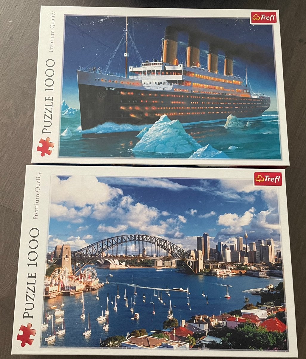 Set van 2 Trefl Puzzels (1000 stukjes) – Titanic & Sydney, Hobby en Vrije tijd, Denksport en Puzzels, Ophalen, 500 t/m 1500 stukjes