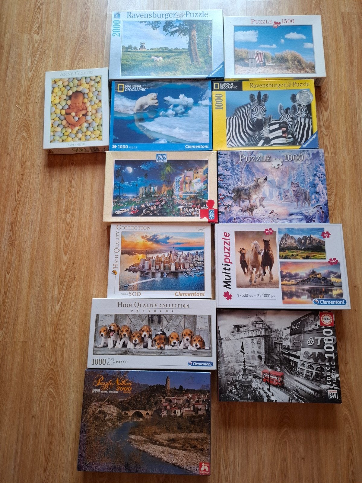 Lot de 12 puzzles entre 500 et 2000 pièces. voir description, Ophalen