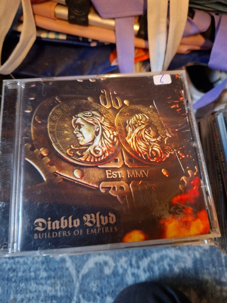 cd - diablo blvd - builders of empires, Cd's en Dvd's, Heavy metal, Ophalen of Verzenden, Zo goed als nieuw, Inclusief boekje
