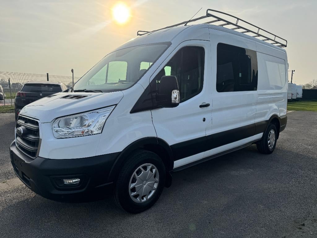 Ford Transit 2.0 L3H2 ecoblue hybrid 6 plaatsen 1st eig boek, Auto's, Bestelwagens en Lichte vracht, Voorwielaandrijving, 1995 cc