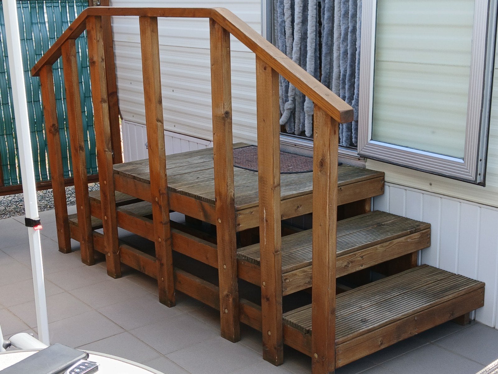 houten trap voor stacaravan, Ophalen