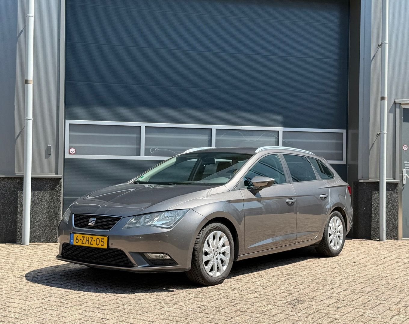 Seat Leon ST 1.6 TDI Ecomotive Lease Comf bj.2014 Navi|Cc|Pd, Grijs, Parkeersensor, Te koop, Leon