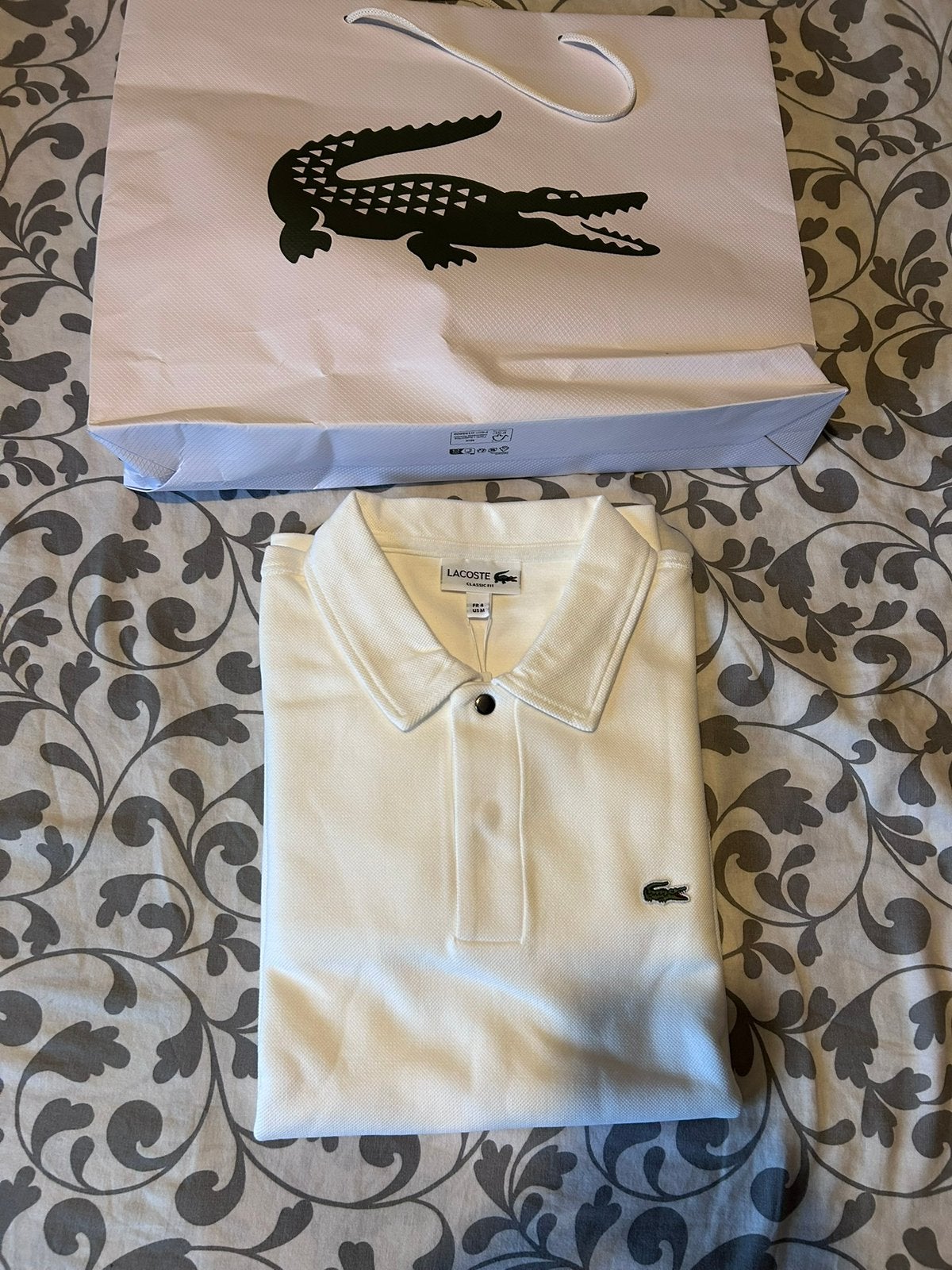 Pull a bouton Lacoste, Enlèvement ou Envoi, Neuf, Taille 48/50 (M), Blanc