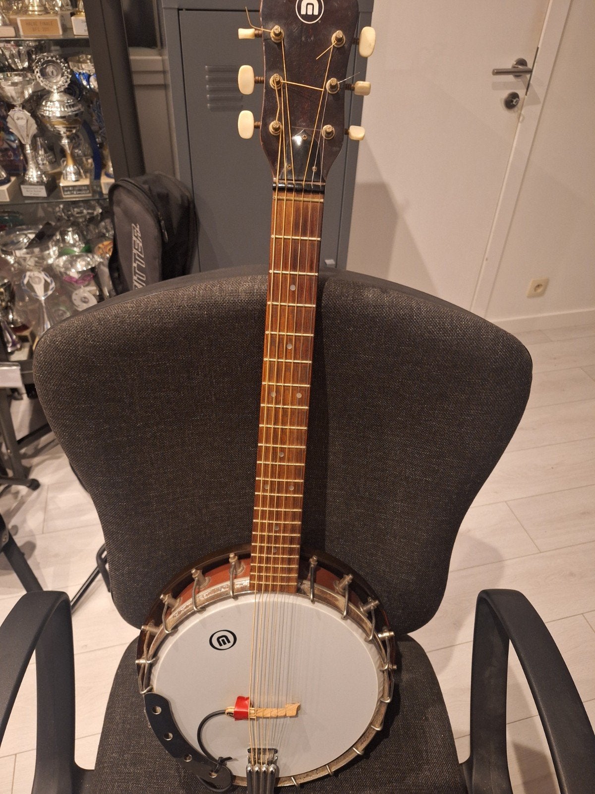 gitaar banjo, Ophalen, Gitaarbanjo