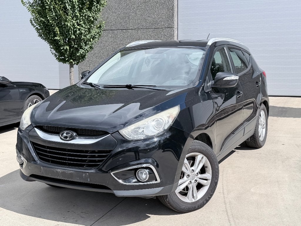 | Hyundai Ix35 | Trekhaak | Airco | 1.7 diesel |, Auto's, Hyundai, Voorwielaandrijving, Euro 5, Zwart, Leder en Stof