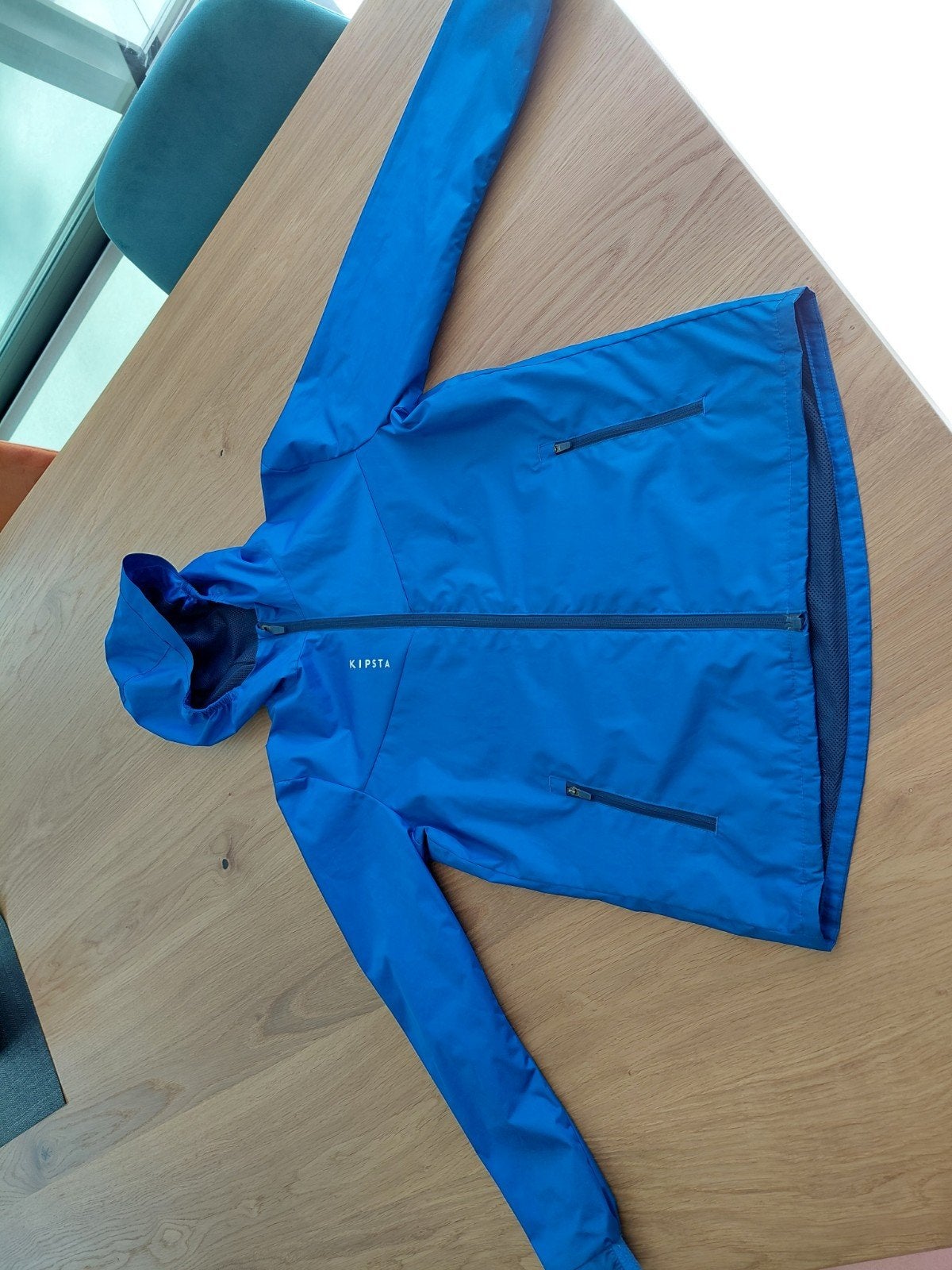 Decathlon Kipsta regenjas maat 131-140, Caravans en Kamperen, Regenkleding, Ophalen of Verzenden, Regenjas