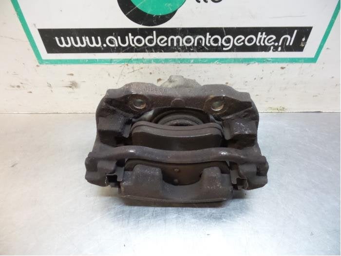 Etrier de frein (pince) avant gauche d'un Citroen C3 (C3 09-, -, 3 mois de garantie, Utilisé, -