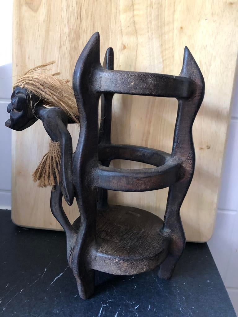 Houten fleshouder, Ophalen