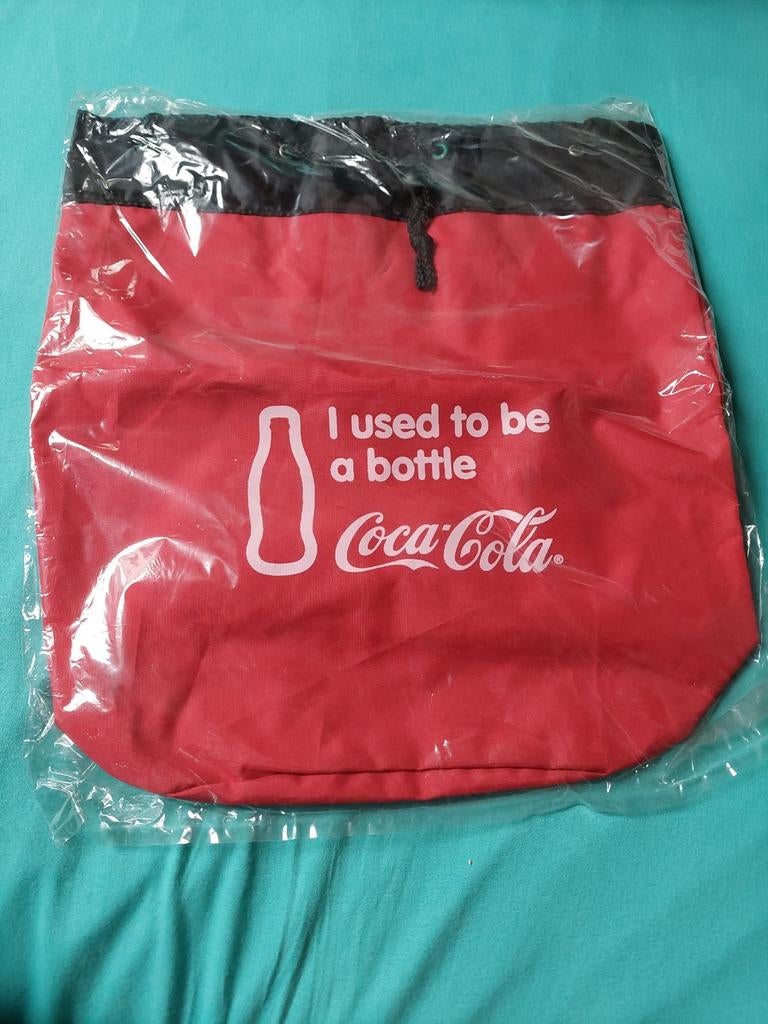 Rugtas van Coca Cola, Ophalen, Nieuw