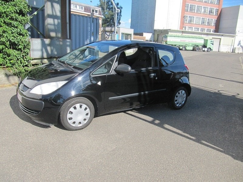 mitsubishi colt benzine, Auto's, Mitsubishi, Voorwielaandrijving, Stof, Zwart, Particulier