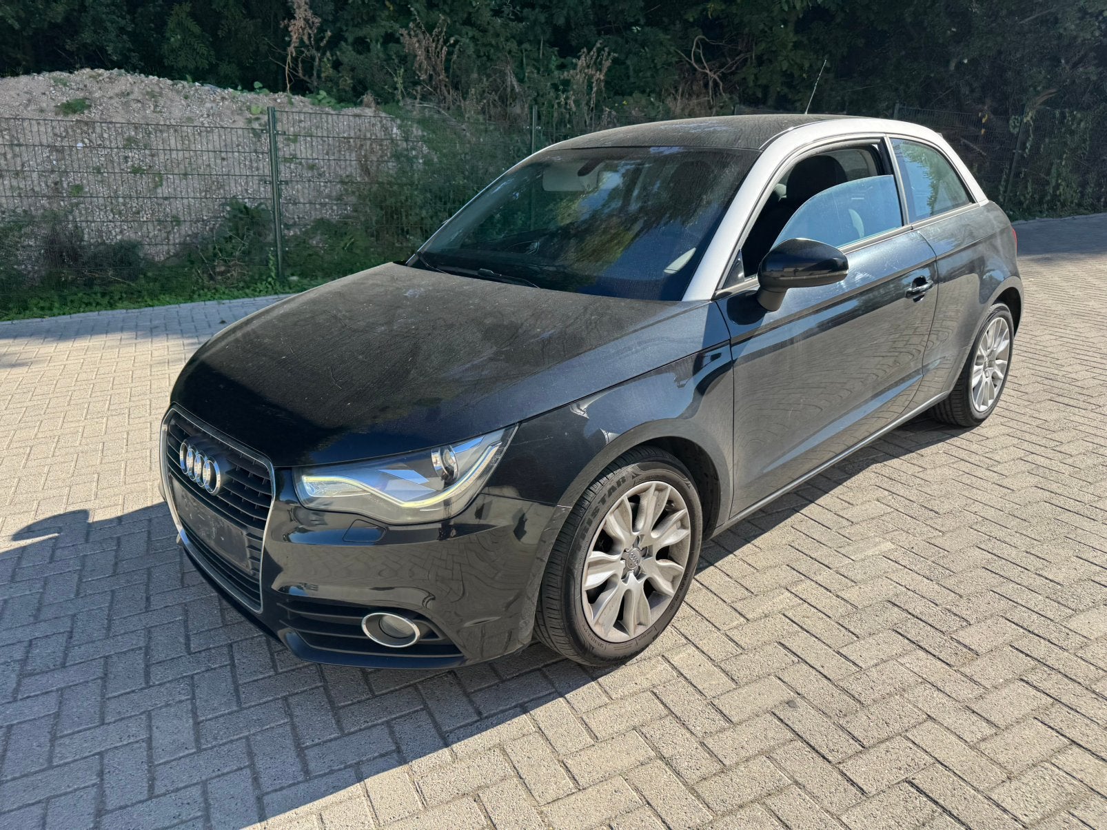 Audi A1 1.6 TDI Airco Navi, Auto's, Euro 5, Stof, A1, Zwart