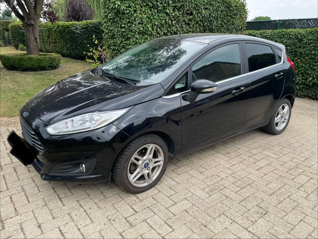 Ford Fiesta titanium 1.0 100pk, Auto's, Voorwielaandrijving, Euro 5, Stof, Zwart