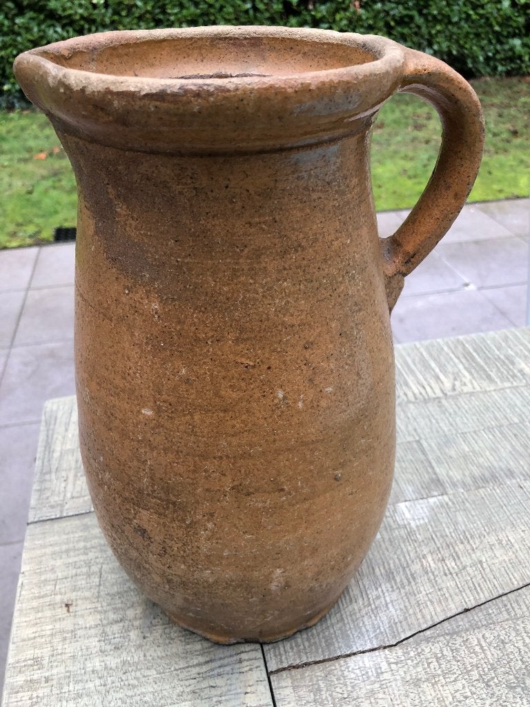 Grote antieke kruik, Ophalen