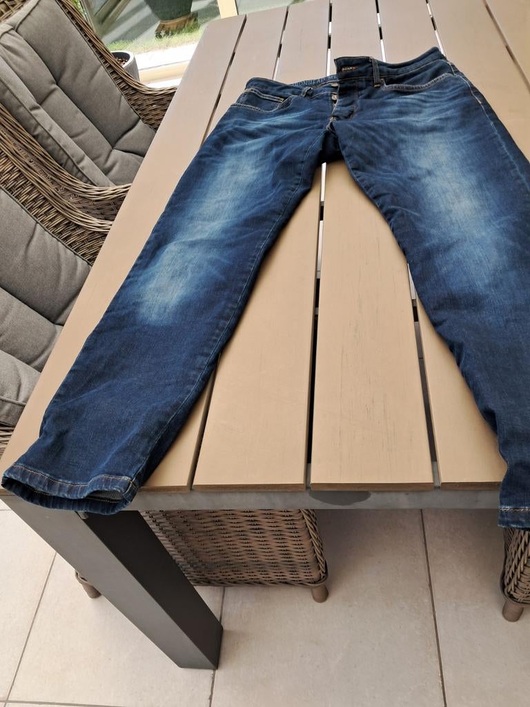 Moto jeansbroek, Ophalen
