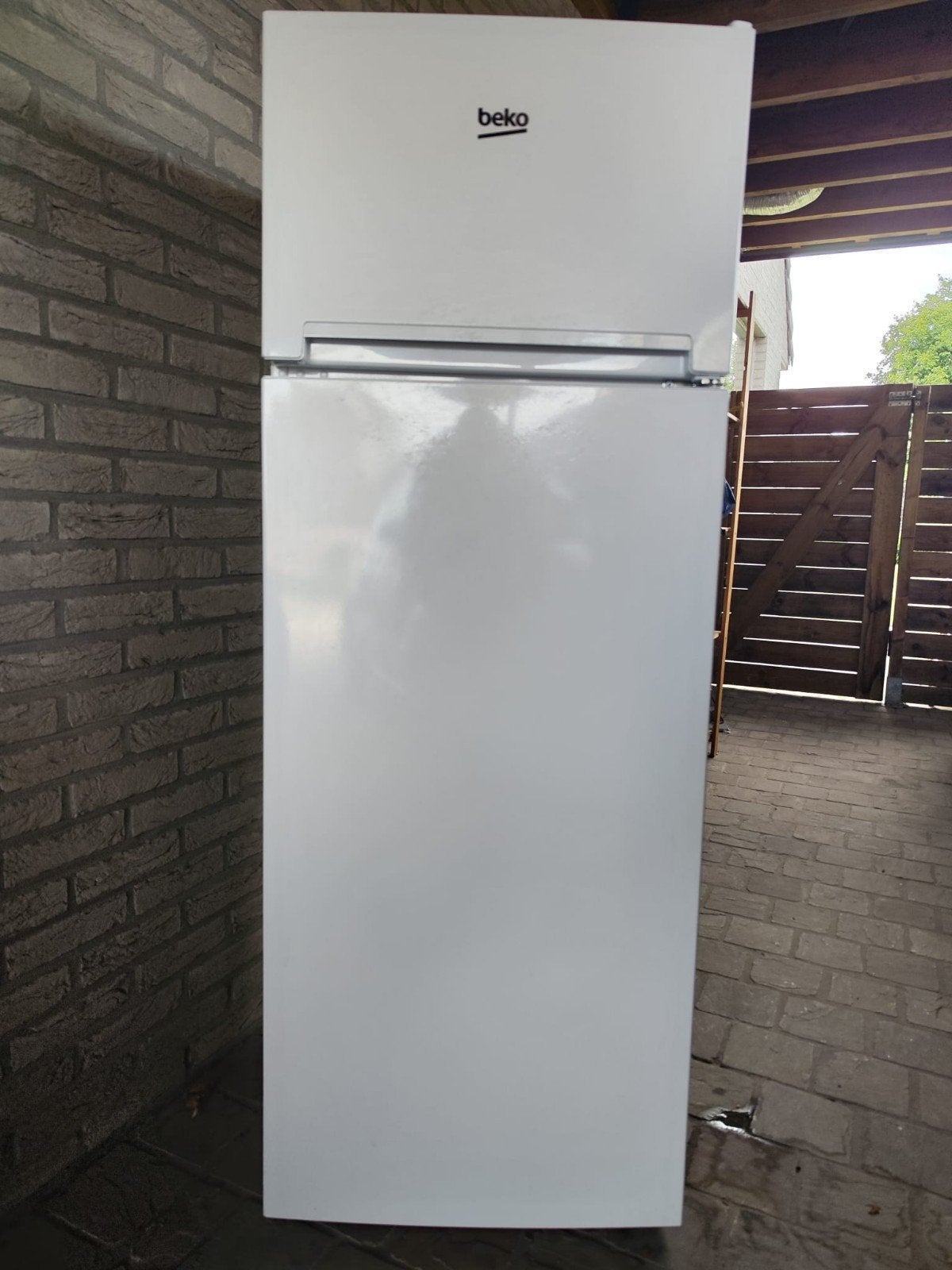Frigo diepvries combi, Ophalen