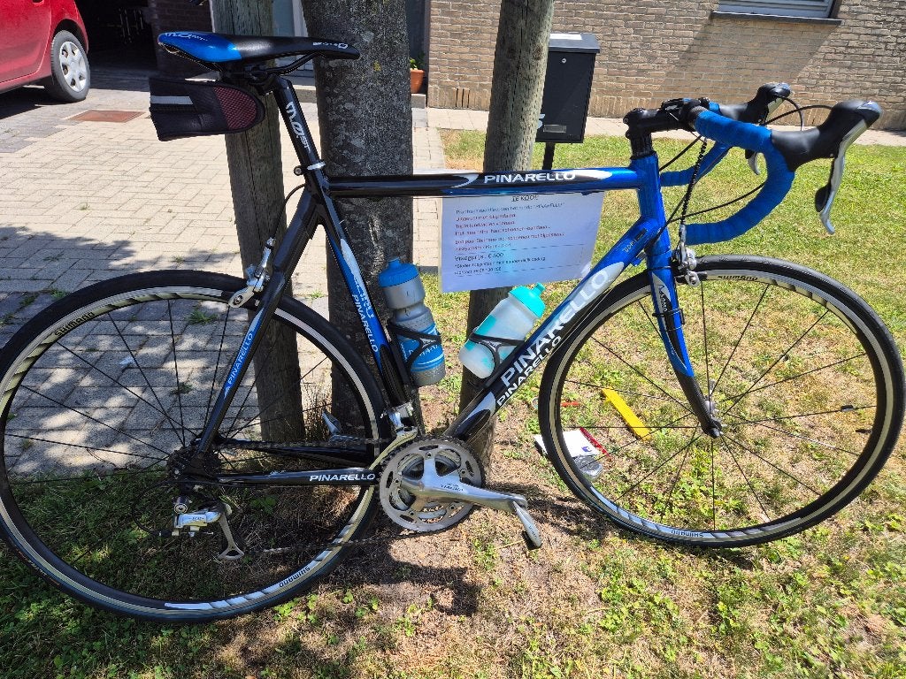 Race fiets van het merk :"Pinarello"., Fietsen en Brommers, 28 inch, 10 tot 15 versnellingen, Aluminium, Zo goed als nieuw