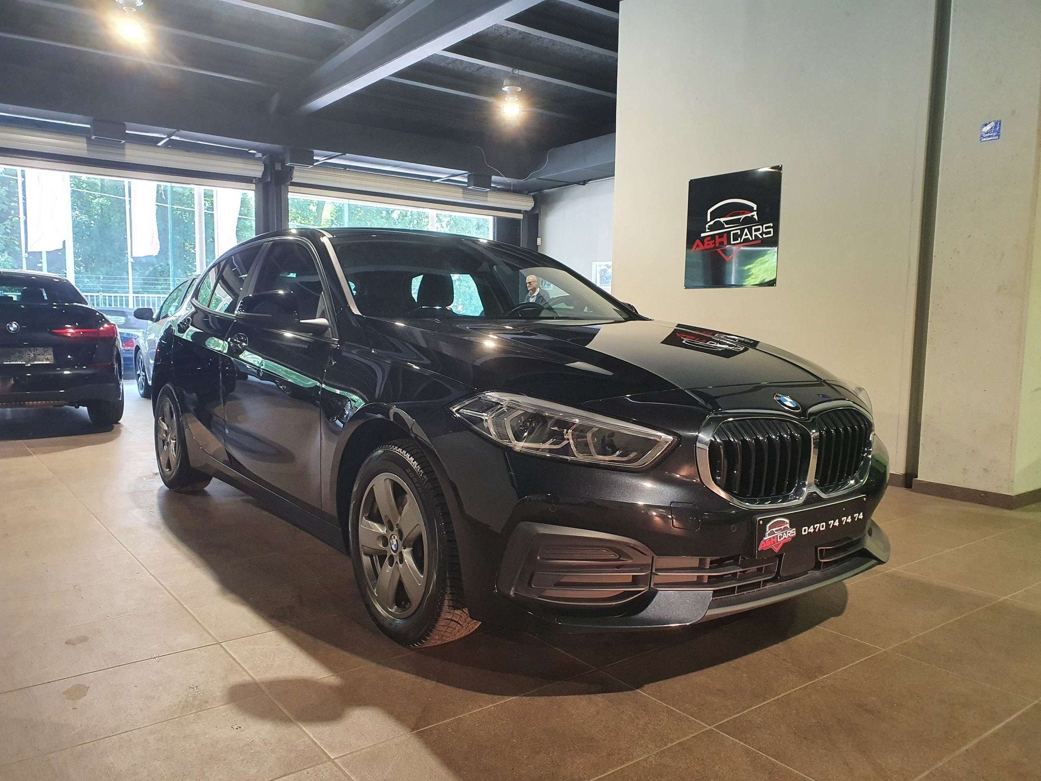 BMW 1 Serie 118 118iA OPF (automatique), Autos, BMW, Euro 6, Entreprise, Noir, 5 portes