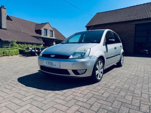 Ford Fiesta 1.3 Benzine * Garantie * Airco *, Auto's, 1299 cc, Stof, Zwart, 4 cilinders