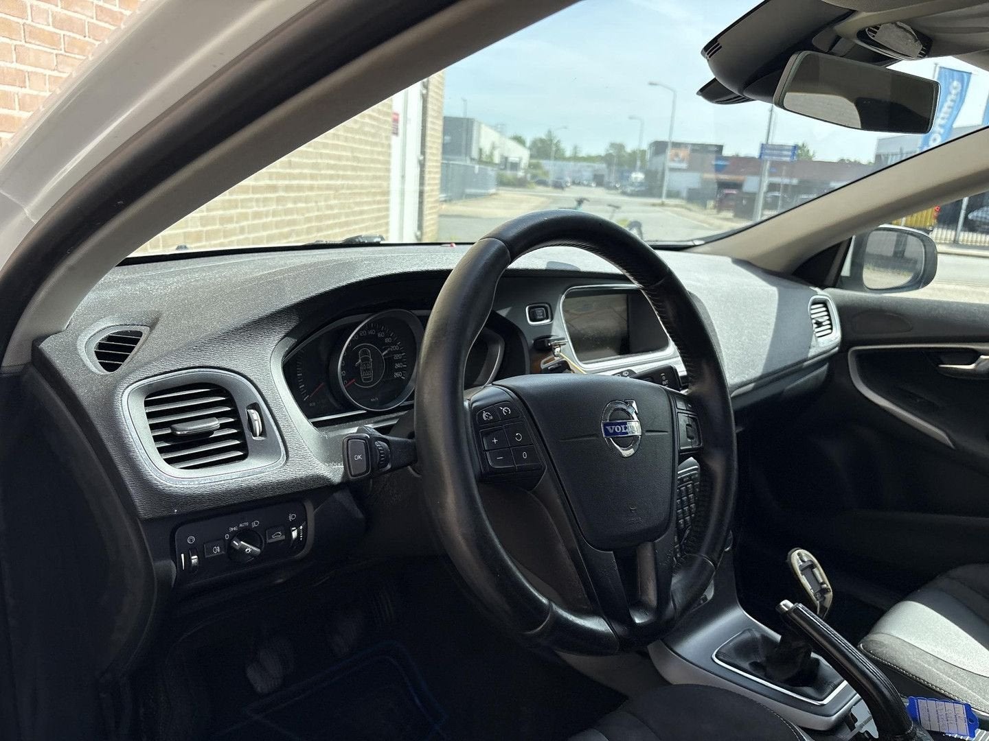 Volvo V40 1.6 D2 Momentum | Climate | Cruise | Navi | PDC |, Auto's, 88 g/km, Zwart, Wit, Bedrijf