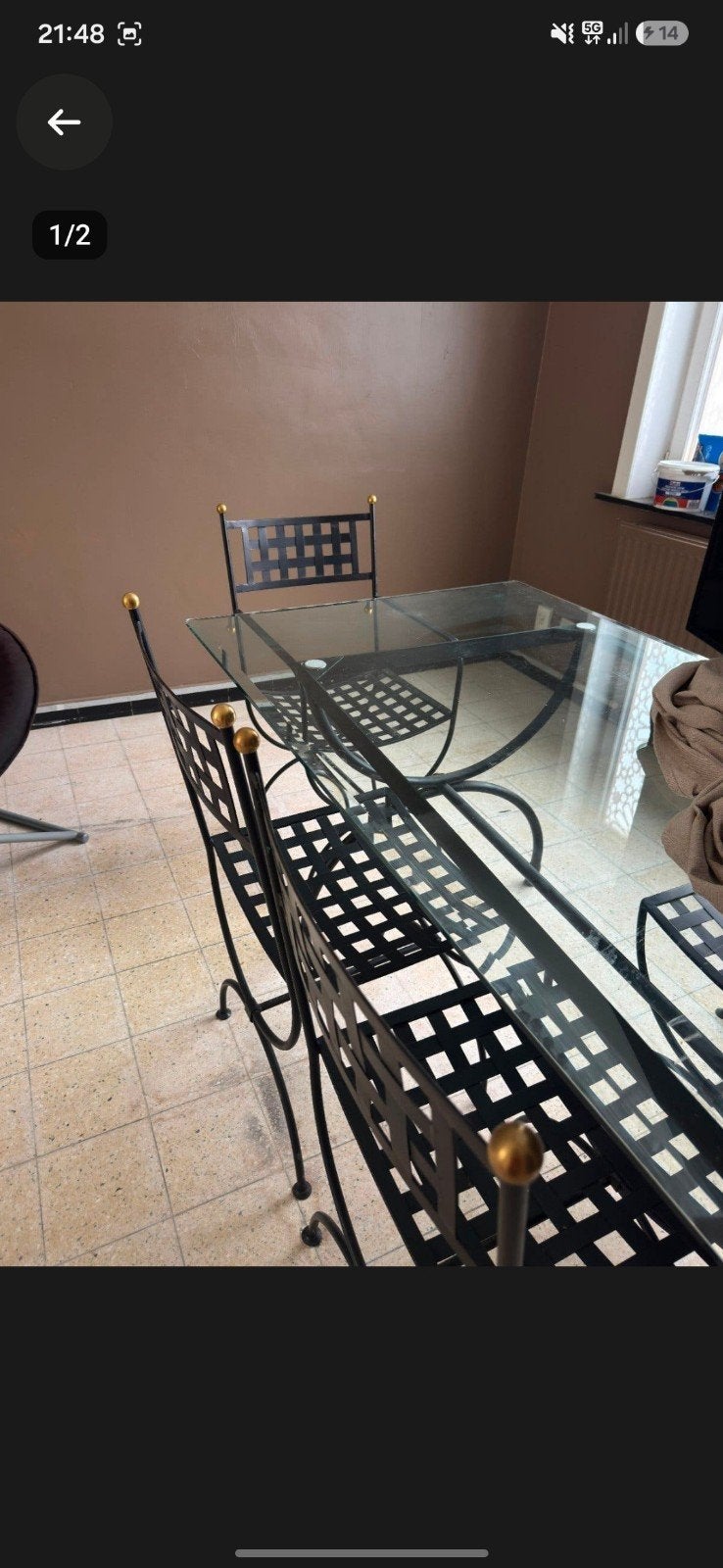 table en fer forgé, Enlèvement