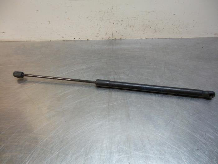 Gasdemper Motorkap links van een Opel Astra (Astra H 04-), Gebruikt, -, -, Opel