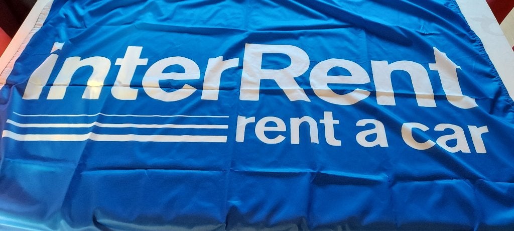 nog nieuwe vlag van Interrent autoverhuur, Verzamelen, Merken en Reclamevoorwerpen, Verzenden, Nieuw, Reclamebord