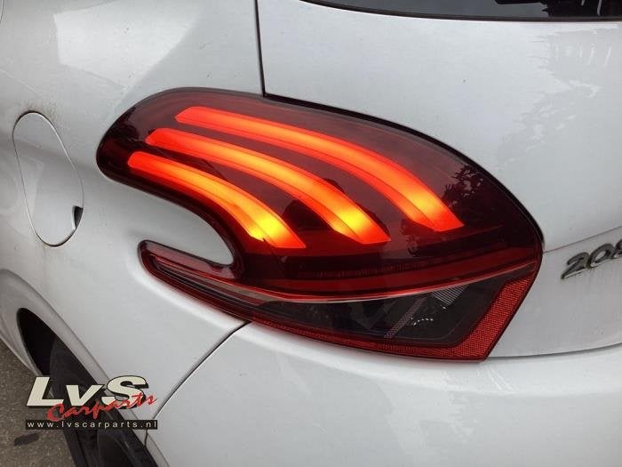 Feu arrière gauche d'un Peugeot 208, Autos : Pièces & Accessoires, -, 3 mois de garantie, Utilisé, -