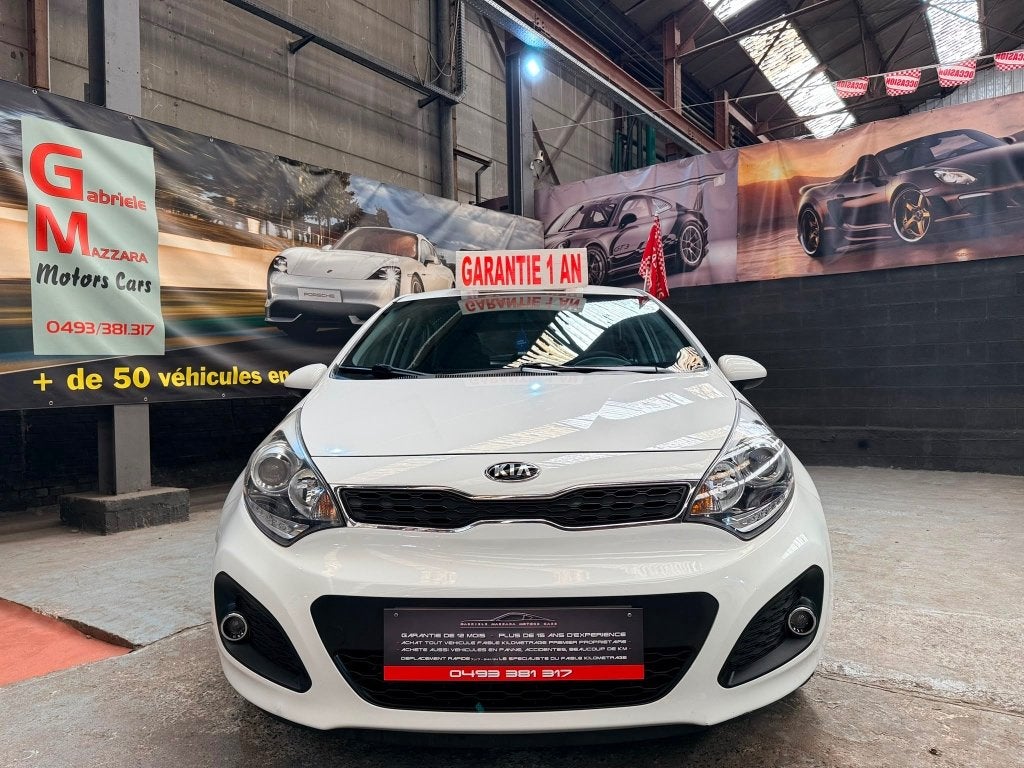 Kia Rio 1.2i Airco J.A., Auto's, Kia, Euro 5, 63 kW, Wit, Leder