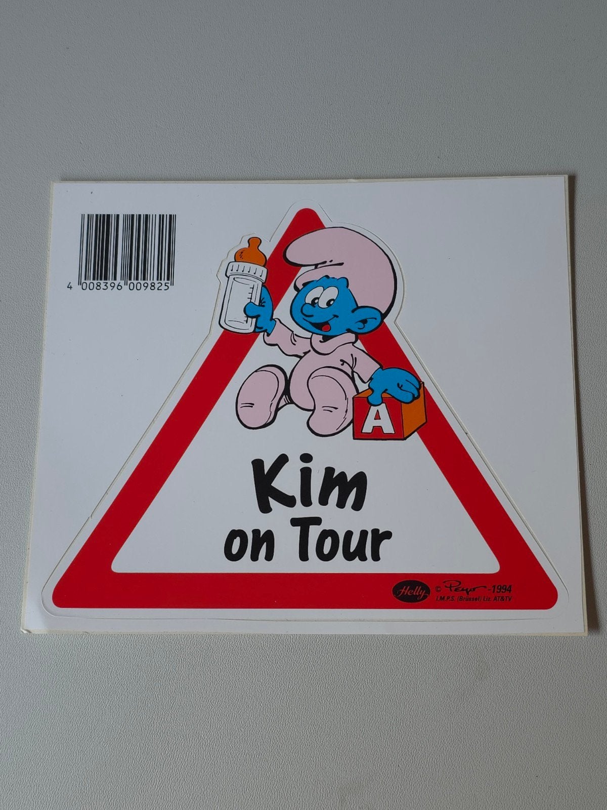 Autocollant Bébé Schtroumpf en voiture Kim, Collections, Schtroumpfs, Envoi, Comme neuf, Bébé Schtroumpf, Autres types