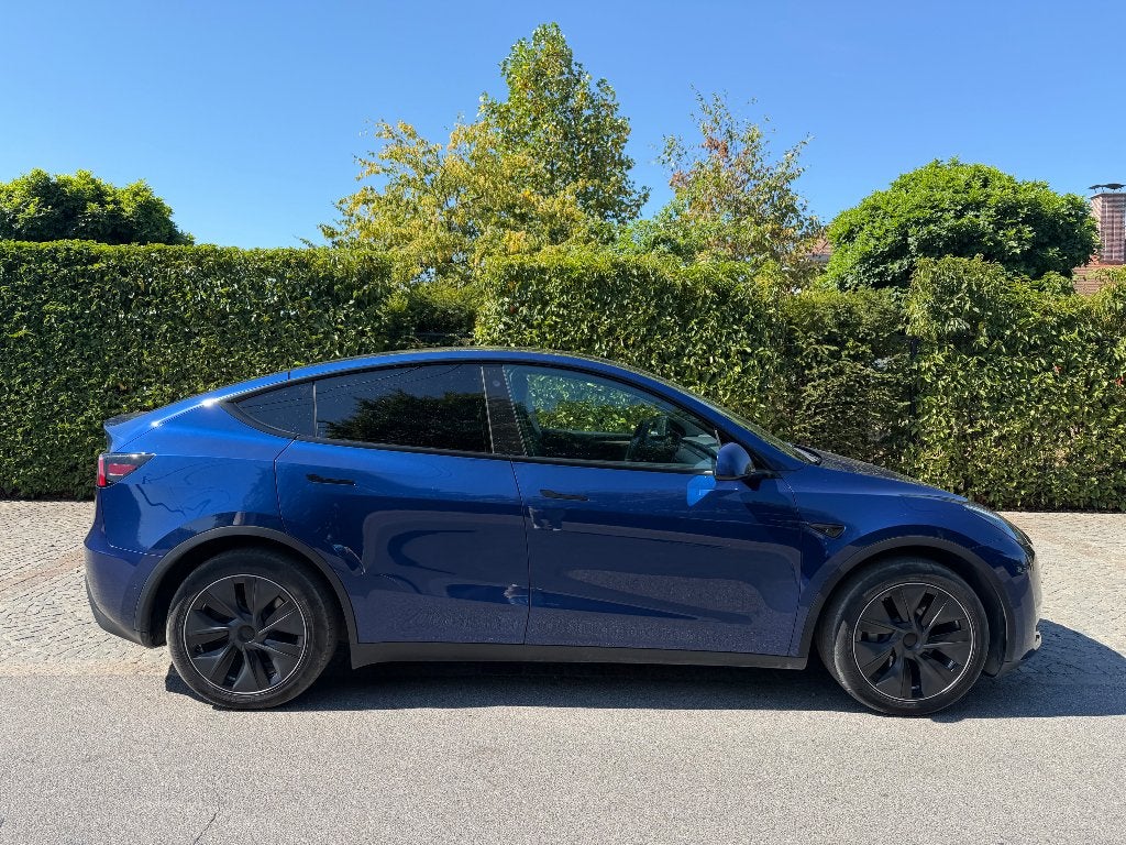 Tesla Model Y Long Range AWD Deep Blue Metallic, Automaat, Blauw, Elektrisch, 5 zetels