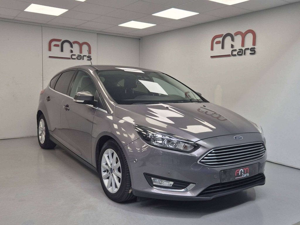 Ford Focus Focus 1.0 EcoBoost Titanium, Focus, Gebruikt, Zwart, https://public.car-pass.be/vhr/167cfe4f-1a10-408a-aac5-63bc3c6f4198