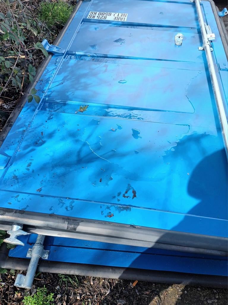 Des portes pour  Un container de mer, Ophalen