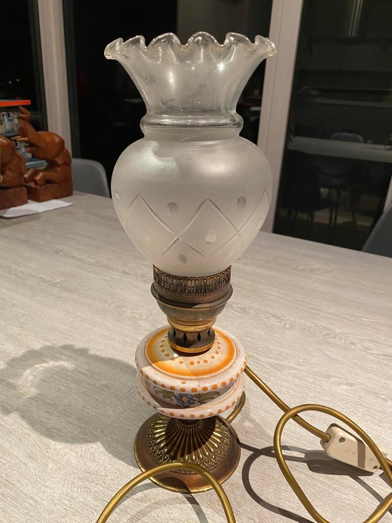 Olie lamp op elektriciteit, Enlèvement