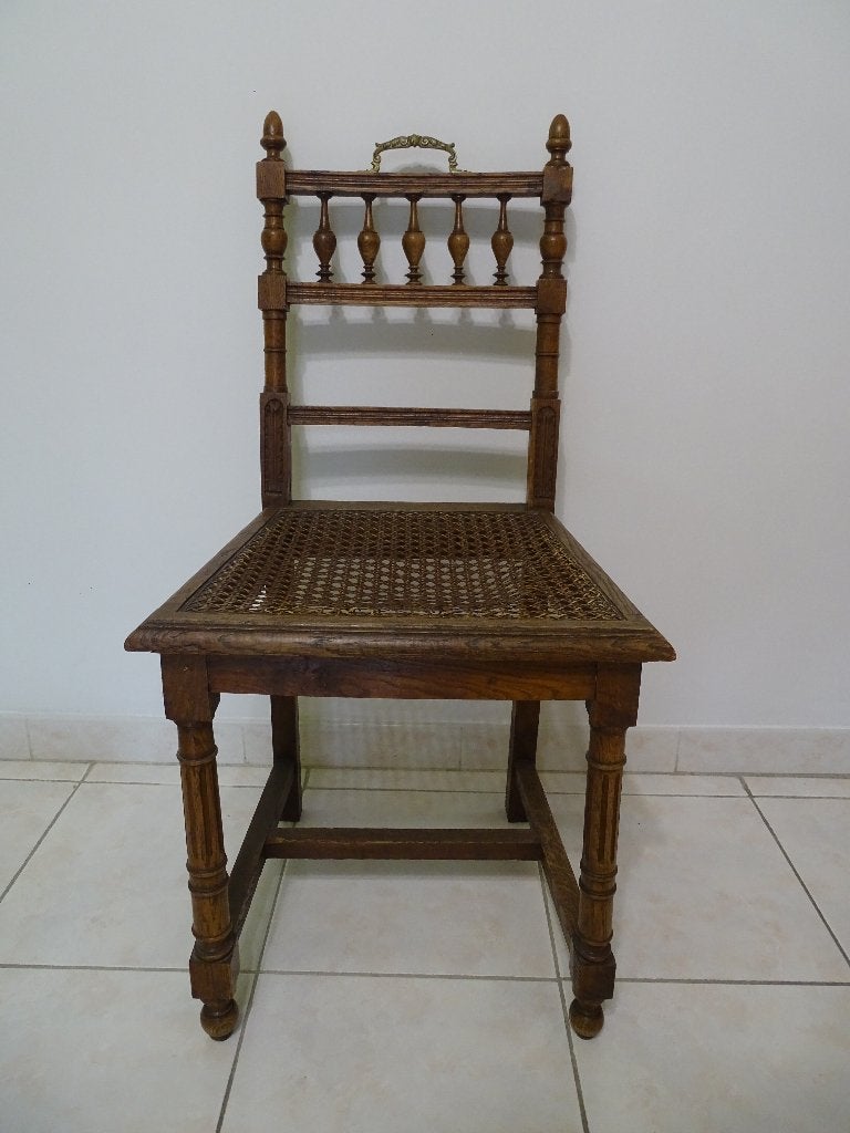 Antieke stoel met rattan cane webbing zitvlak, Ophalen