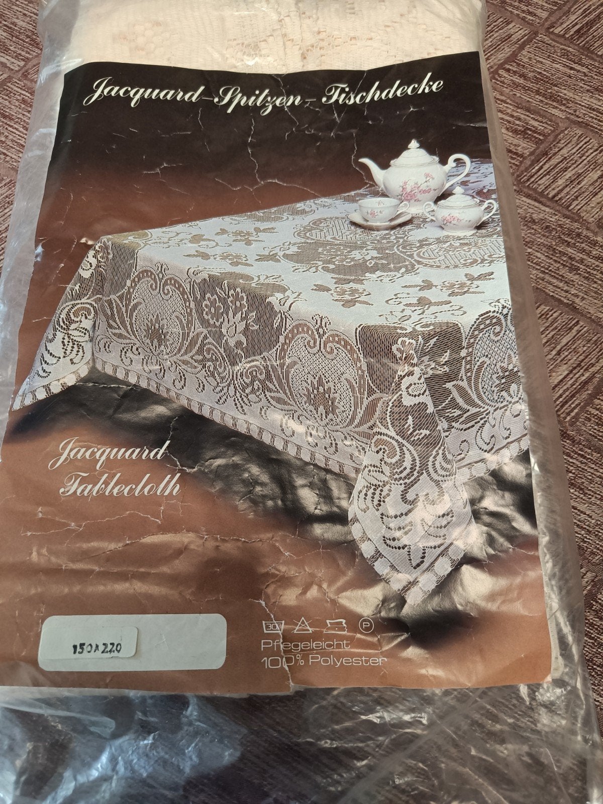 Kanten tafeldoek 150 op 220, Ophalen