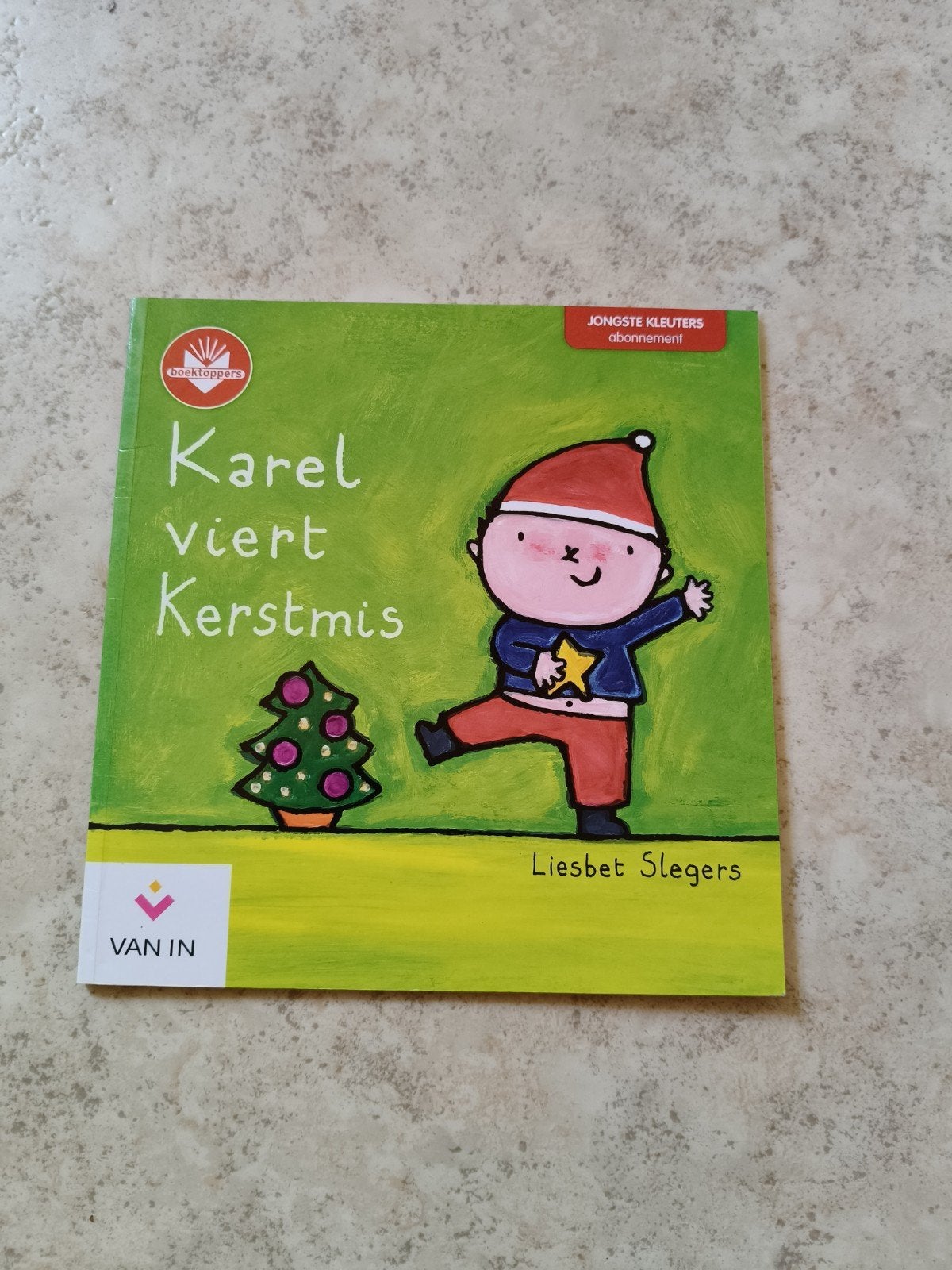 kleuterboek Karel viert kerstmis, Ophalen
