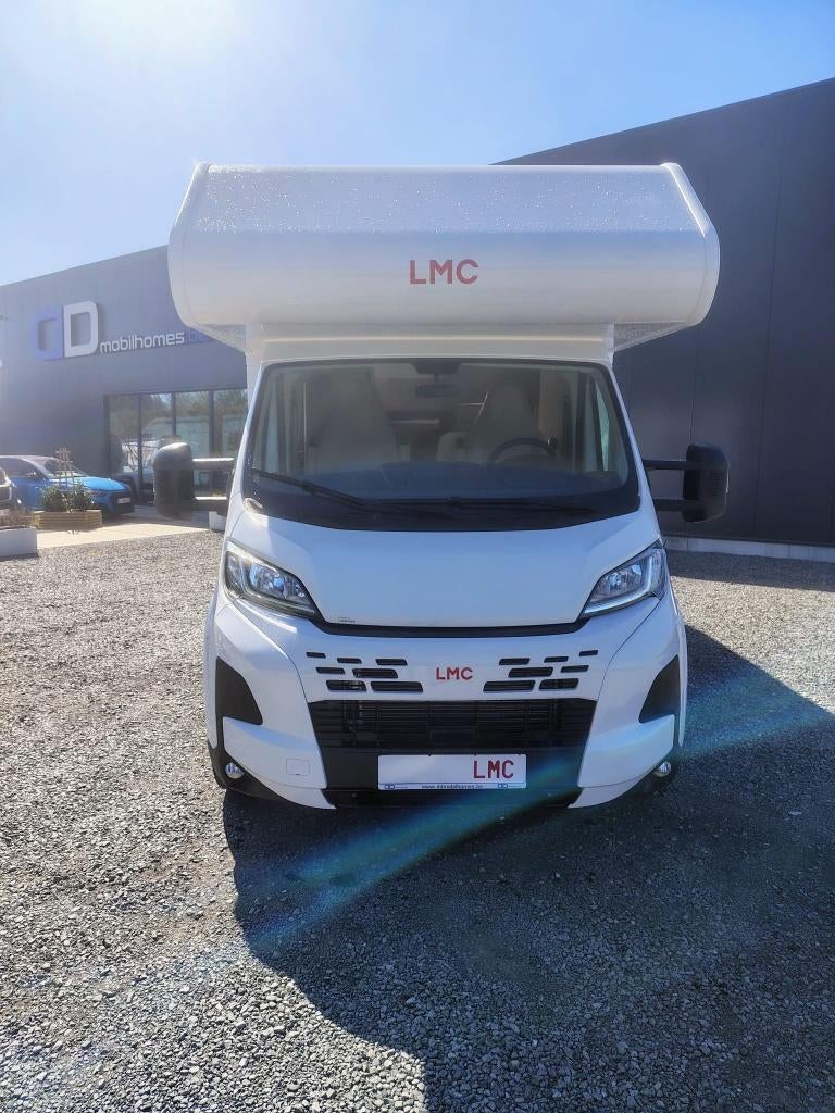 🚐✨ LMC A690 –Gezinscamper 6 plaatsen -  € 69950 🔥, Siège de train, 6 à 7 mètres, Boîte manuelle, Jusqu'à 6