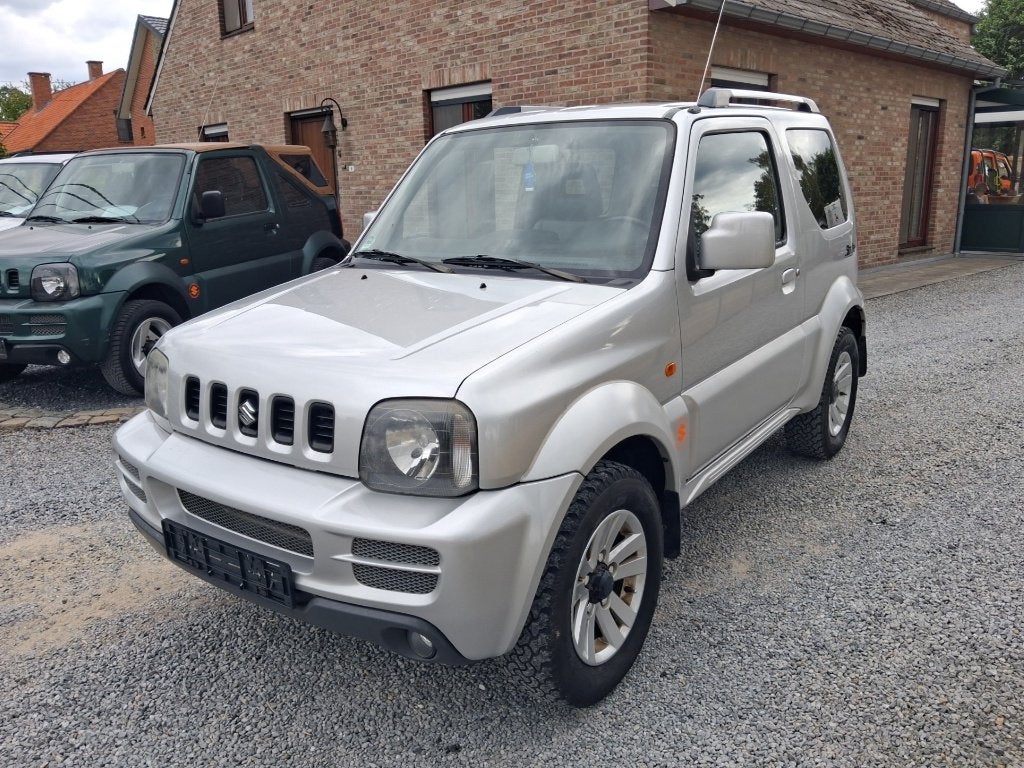 suzuki jimny #bj 2011# 1300cc benzine !!airco gps!! gekeurd, Autos, Cuir, Argent ou Gris, Achat, Entreprise