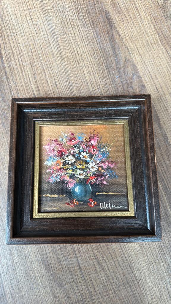Cadre fleurs huile, Ophalen