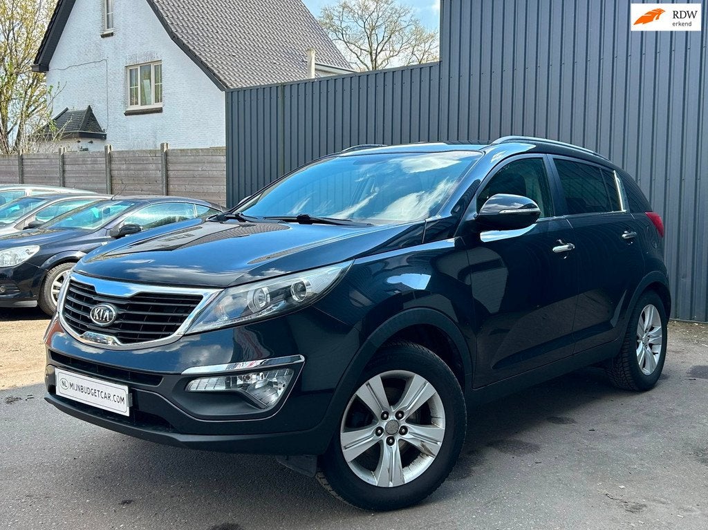 Kia Sportage 2.0 X-ecutive Plus Pack, Gebruikt, 4 cilinders, Leder en Stof, Zwart